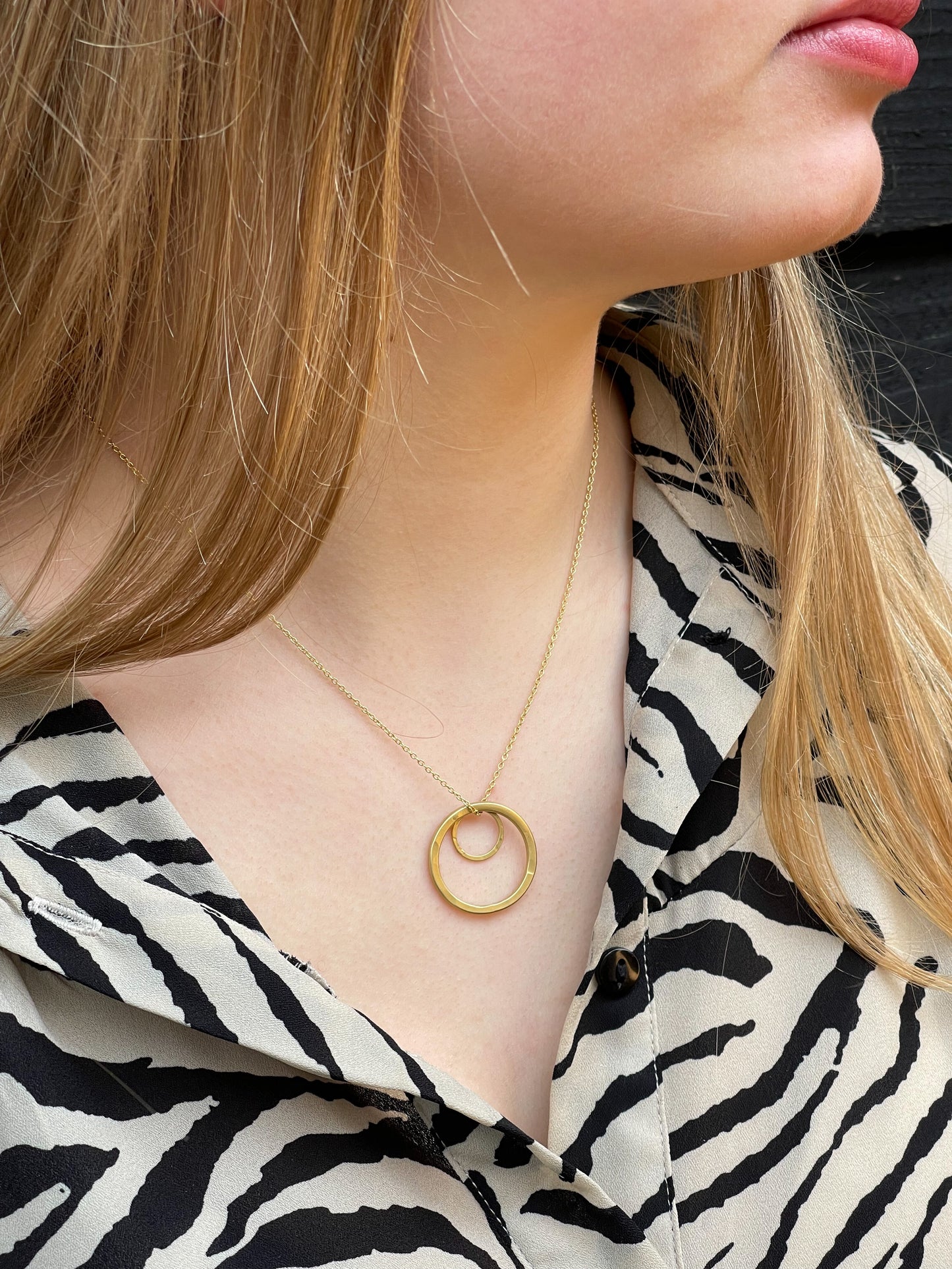 gold necklace grow on model