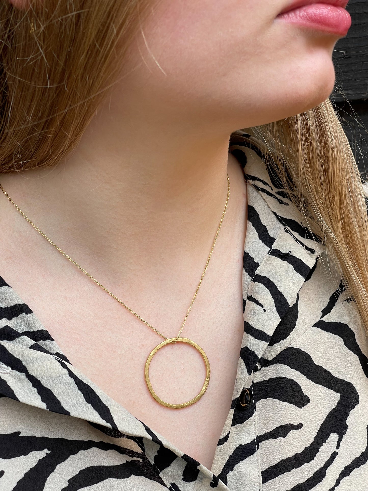 gold necklace strong on model